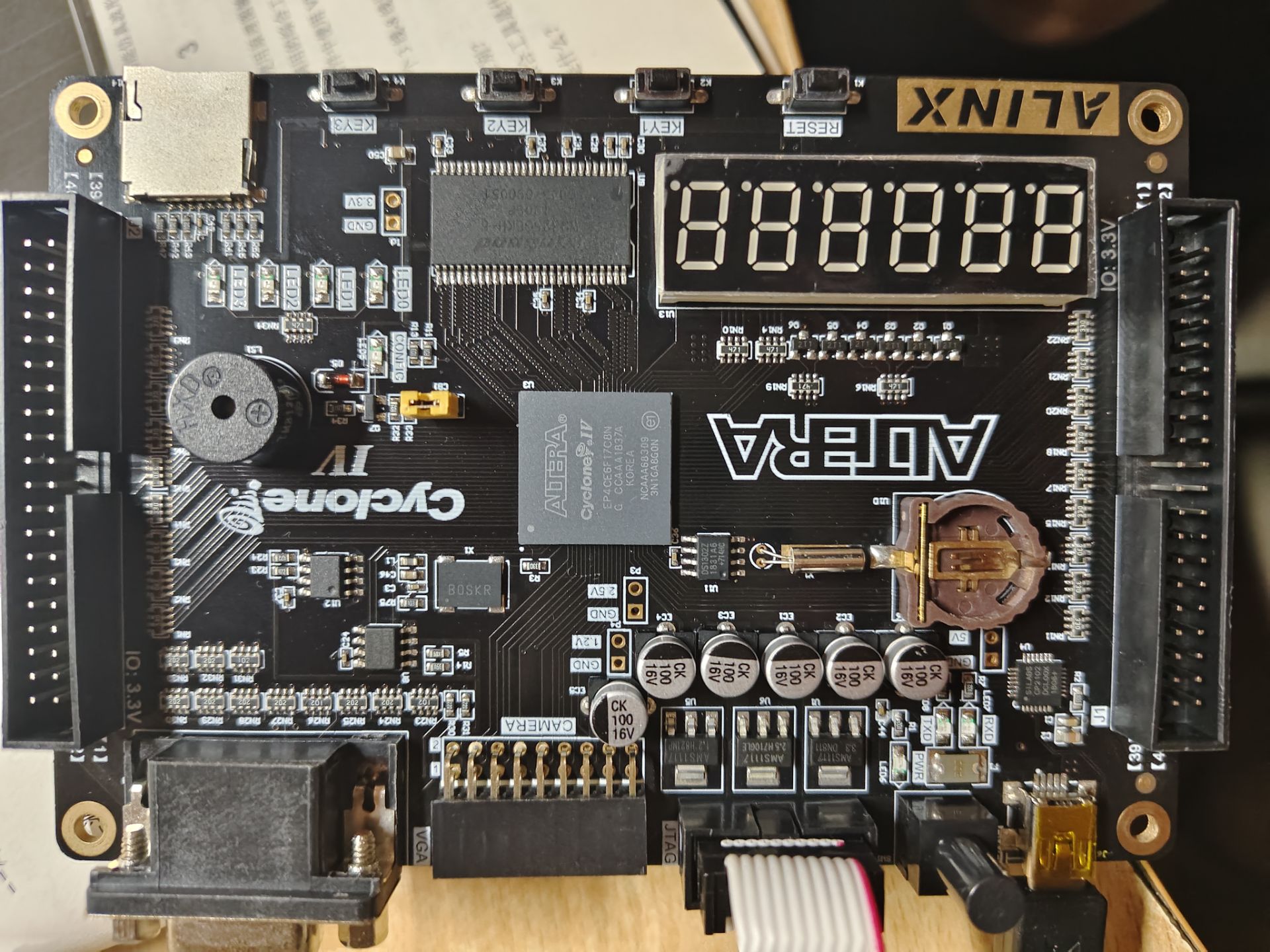 具有整点报时的数字钟的设计VHDL代码Q